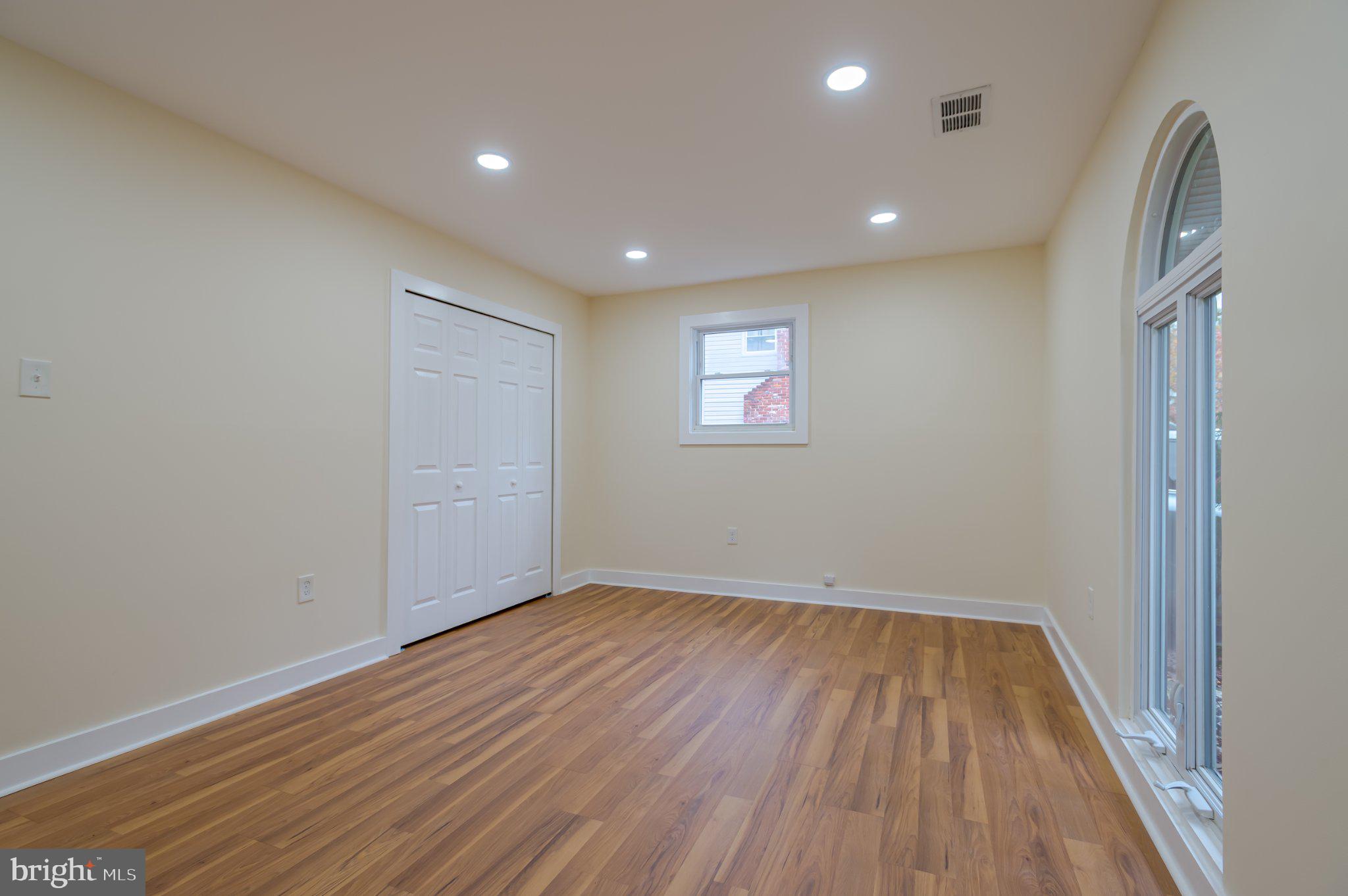 104 Hopewell Road Marlton, NJ 08053 - Photo 22 of 27 a view of room with window and wooden floor