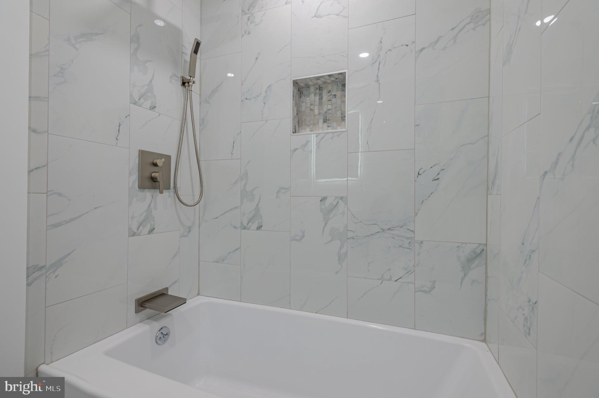 104 Hopewell Road Marlton, NJ 08053 - Photo 25 of 27 a bathroom with a bath tub with a shower