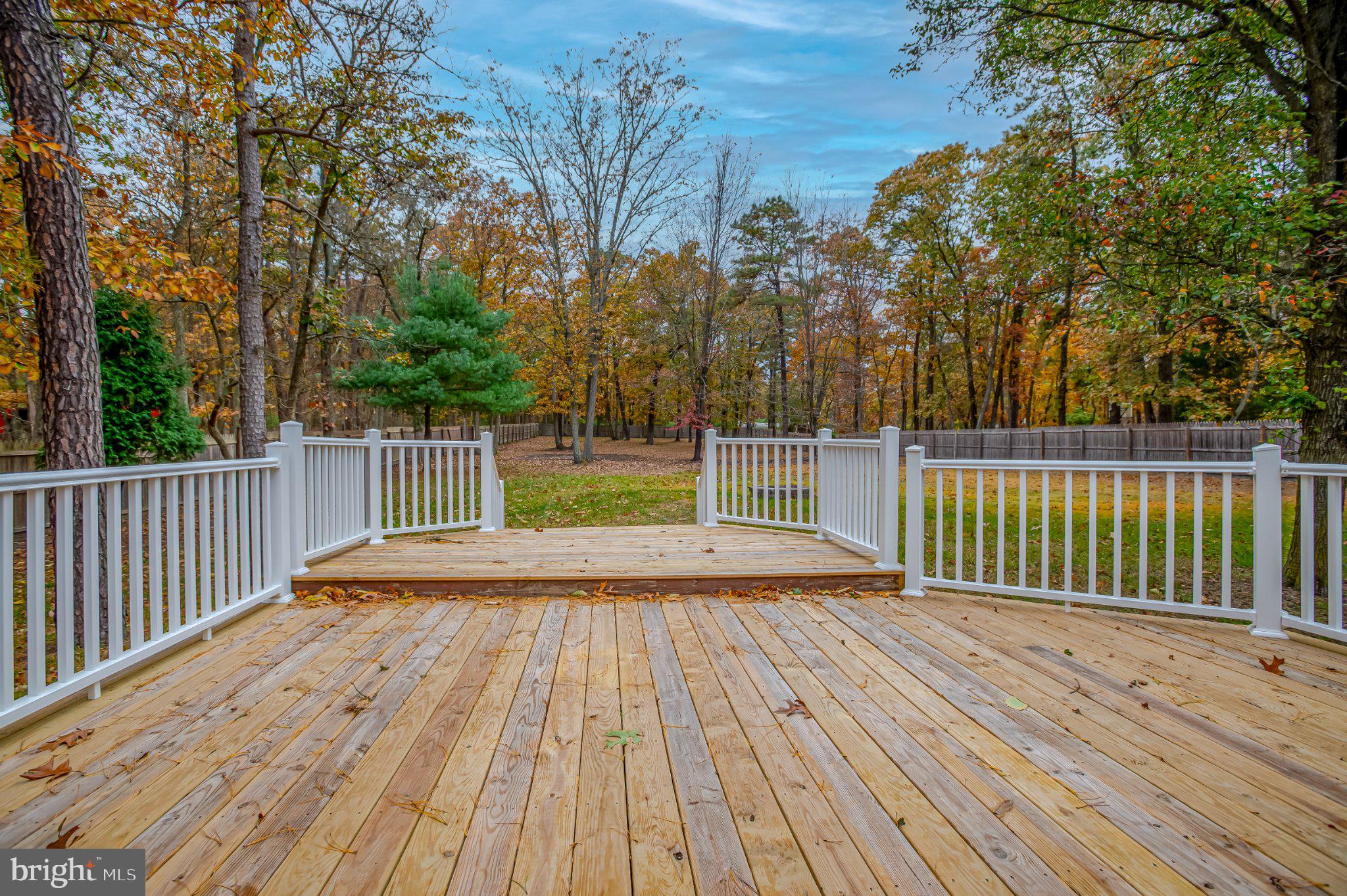 104 Hopewell Road Marlton, NJ 08053 - Photo 26 of 27 a view of backyard with a wooden deck