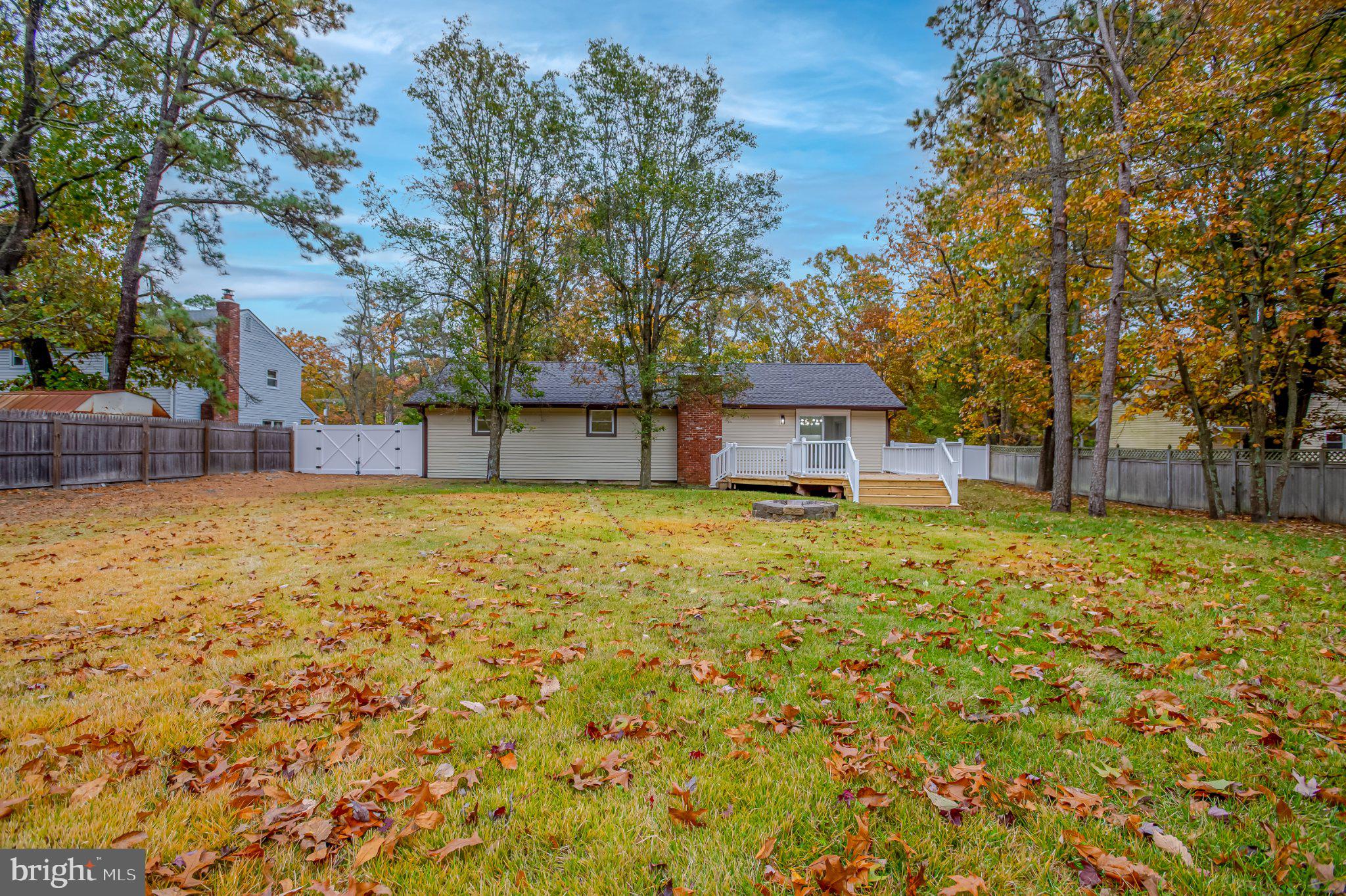 104 Hopewell Road Marlton, NJ 08053 - Photo 27 of 27 a house with trees in front of it