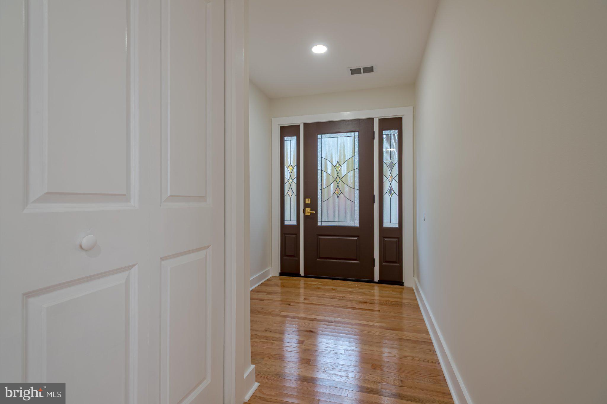 104 Hopewell Road Marlton, NJ 08053 - Photo 4 of 27 a view of a hallway with wooden floor