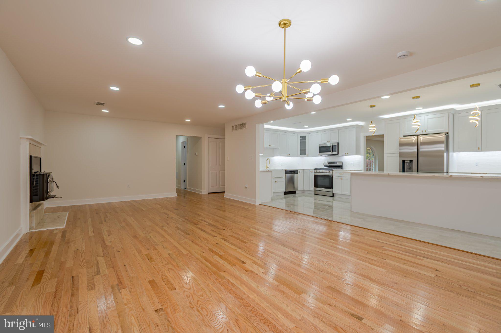 104 Hopewell Road Marlton, NJ 08053 - Photo 9 of 27 a view of a kitchen with a sink kitchen view and a chandelier