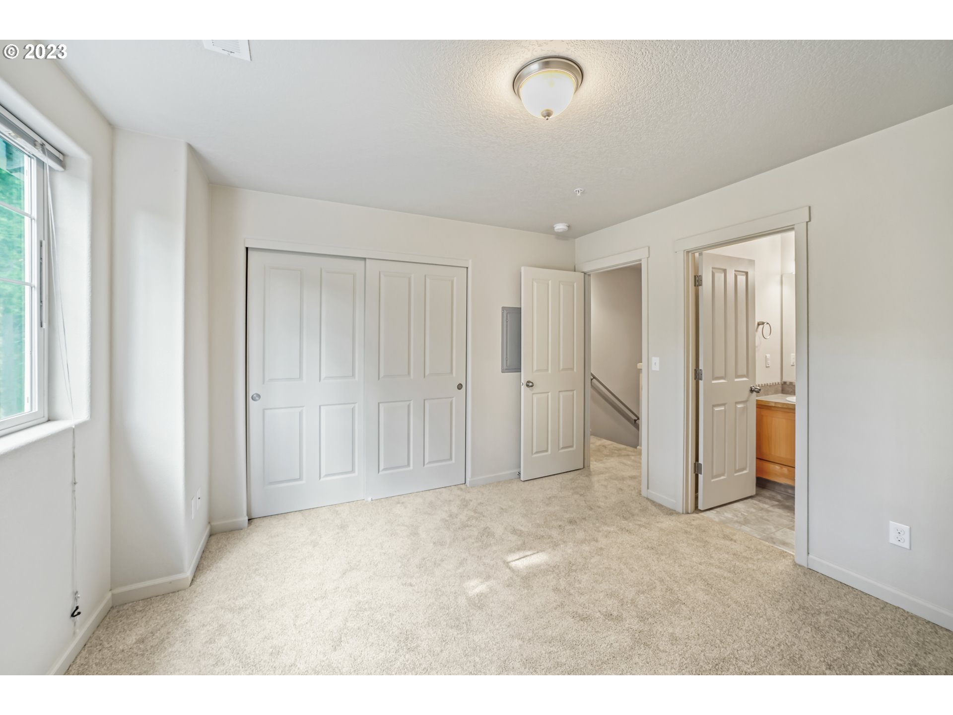 10595 Northeast Cedar Falls Loop Hillsboro, OR 97006 - Photo 12 of 27 a view of an empty room