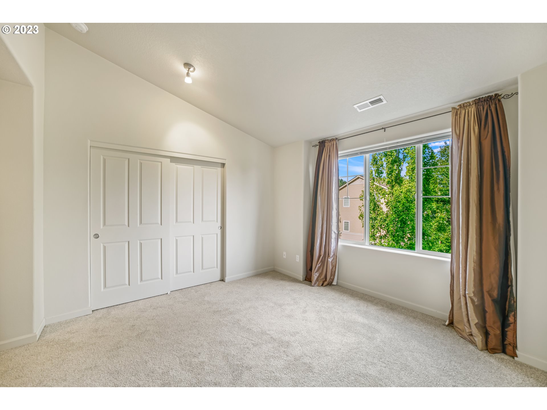10595 Northeast Cedar Falls Loop Hillsboro, OR 97006 - Photo 19 of 27 a view of an empty room with a window
