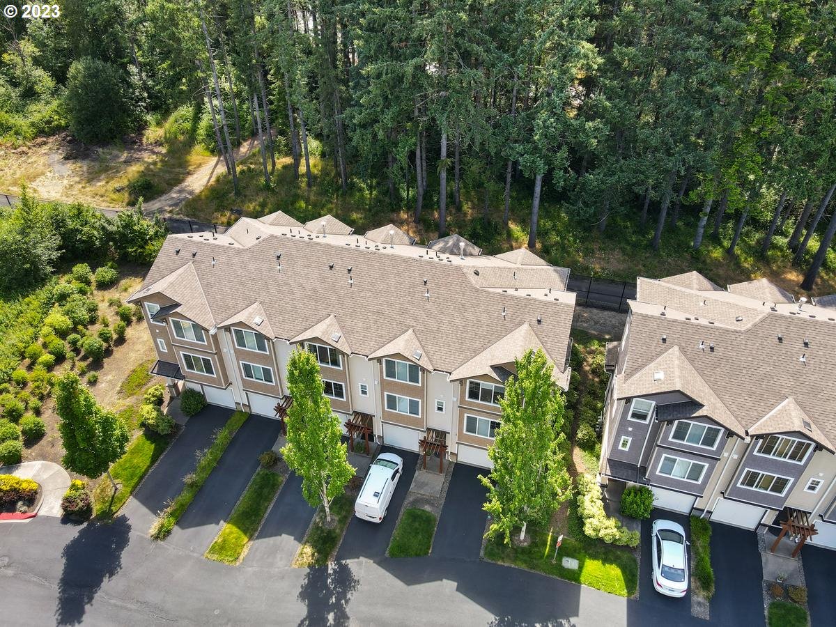 10595 Northeast Cedar Falls Loop Hillsboro, OR 97006 - Photo 24 of 27 an aerial view of a house with garden space and street view