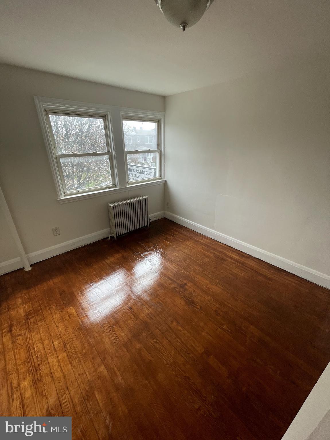 100 Willow Spring Road Dundalk, MD 21222 - Photo 1 of 8 an empty room with windows