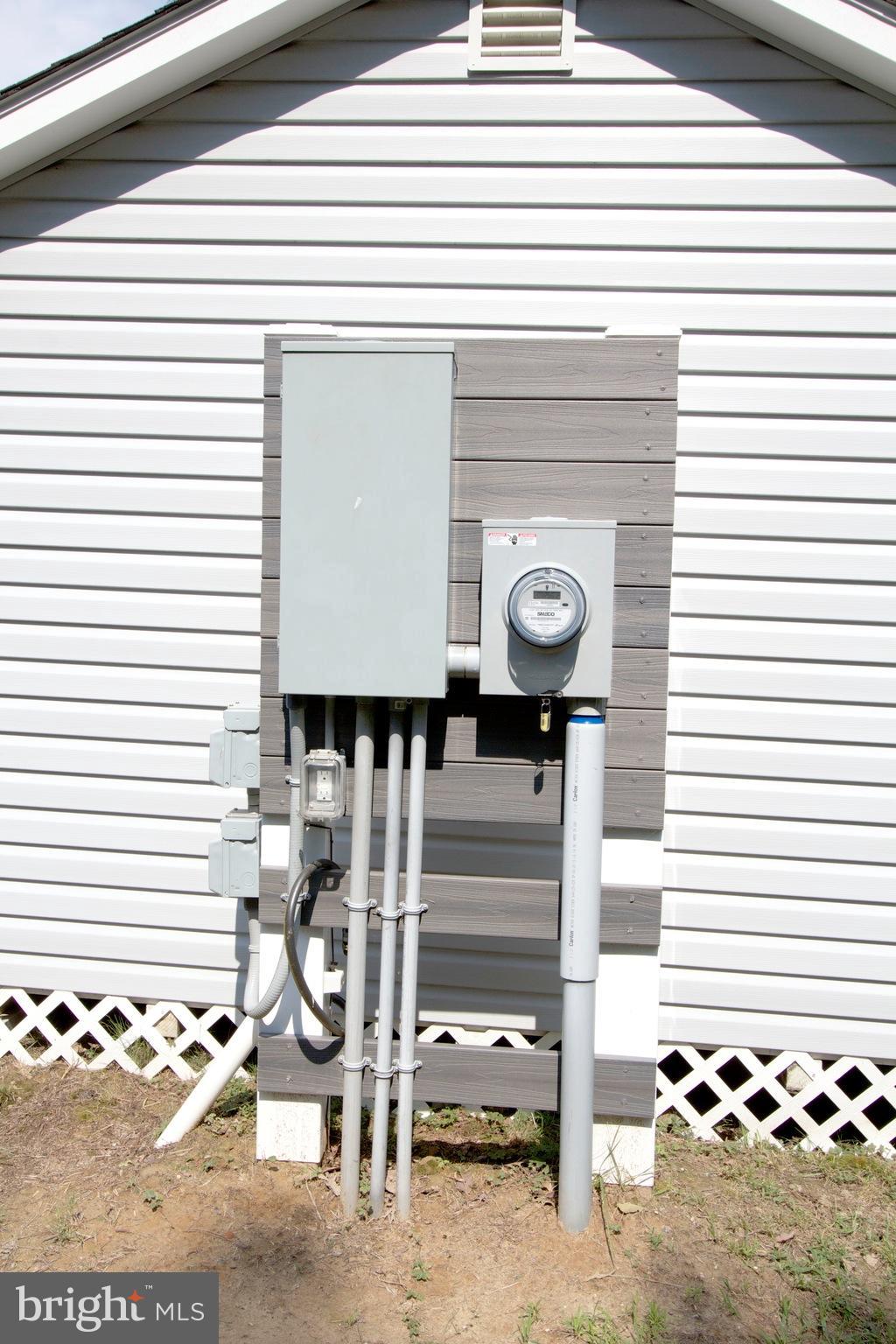 13422 Olivet Road Lusby, MD 20657 - Photo 23 of 23 a front view of a house with barbeque area