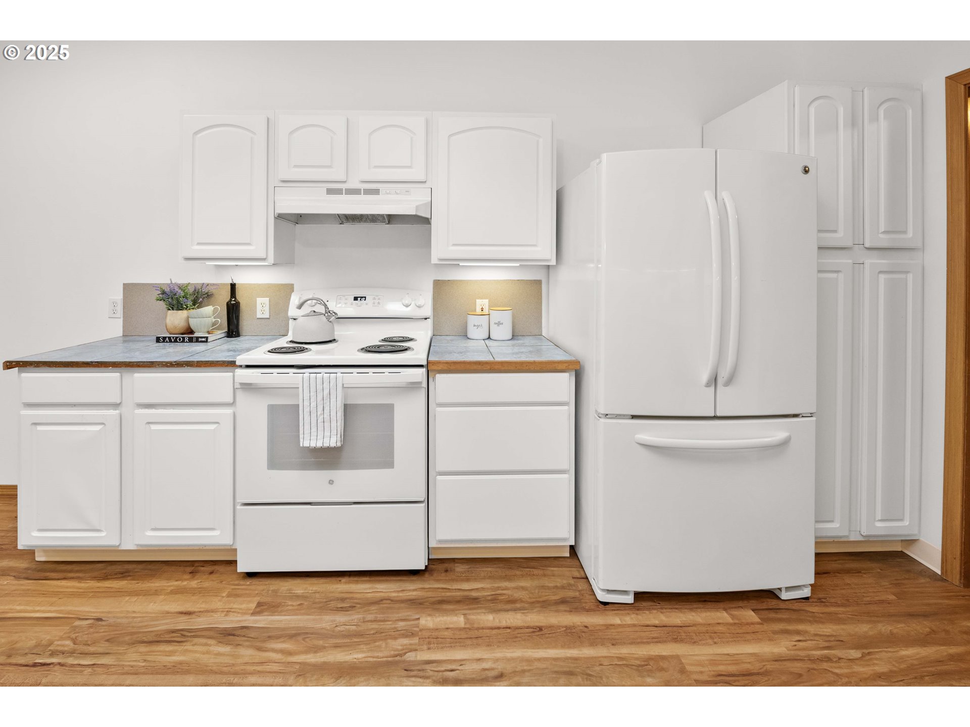 89022 Welch Road Astoria, OR 97103 - Photo 14 of 42 a kitchen with stainless steel appliances a refrigerator and cabinets