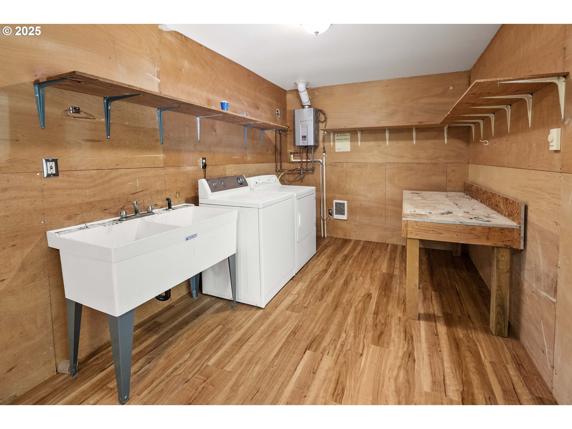89022 Welch Road Astoria, OR 97103 - Photo 27 of 42 a bathroom with a sink and a mirror