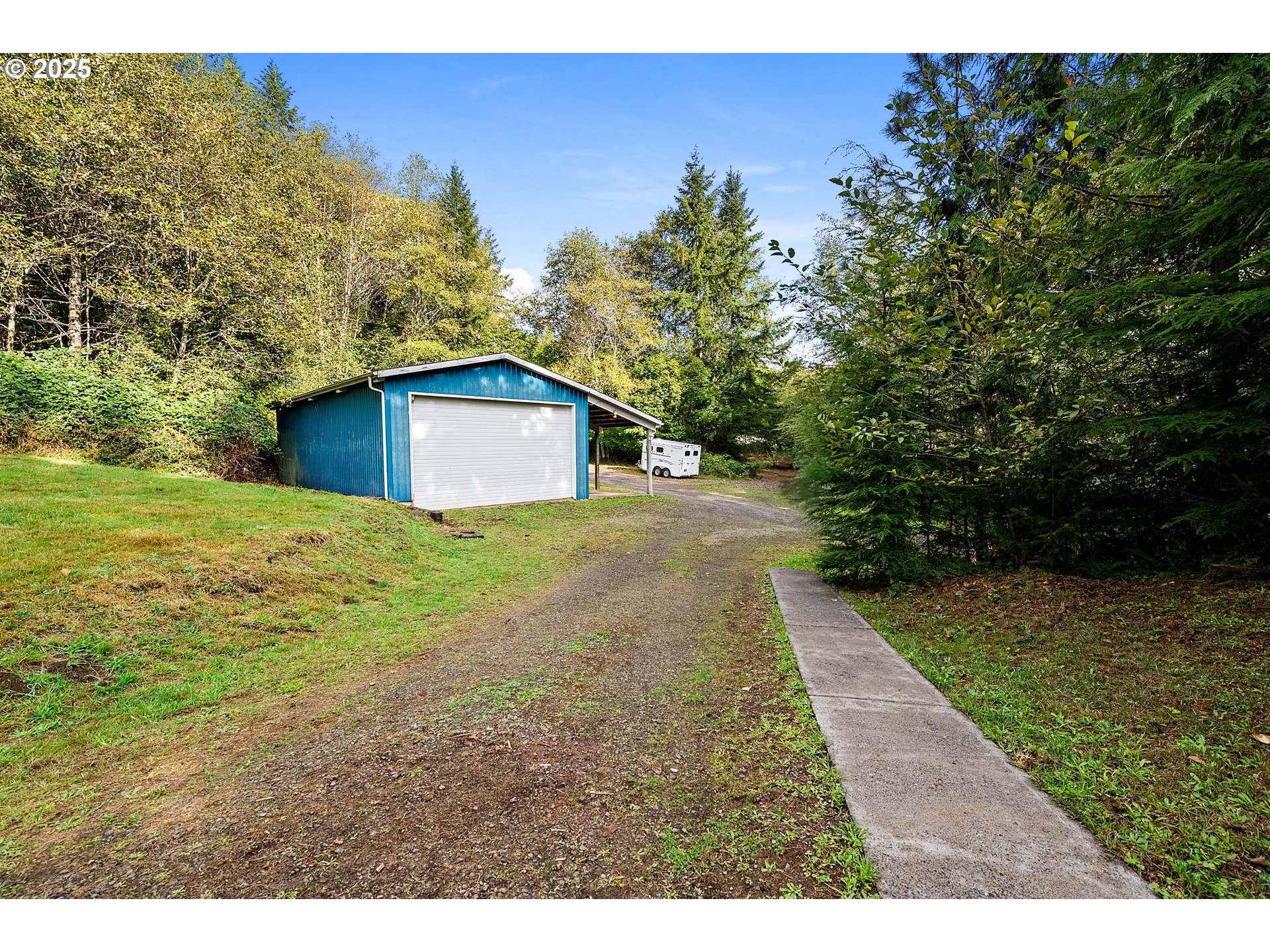 89022 Welch Road Astoria, OR 97103 - Photo 34 of 42 a view of a yard with an outdoor space