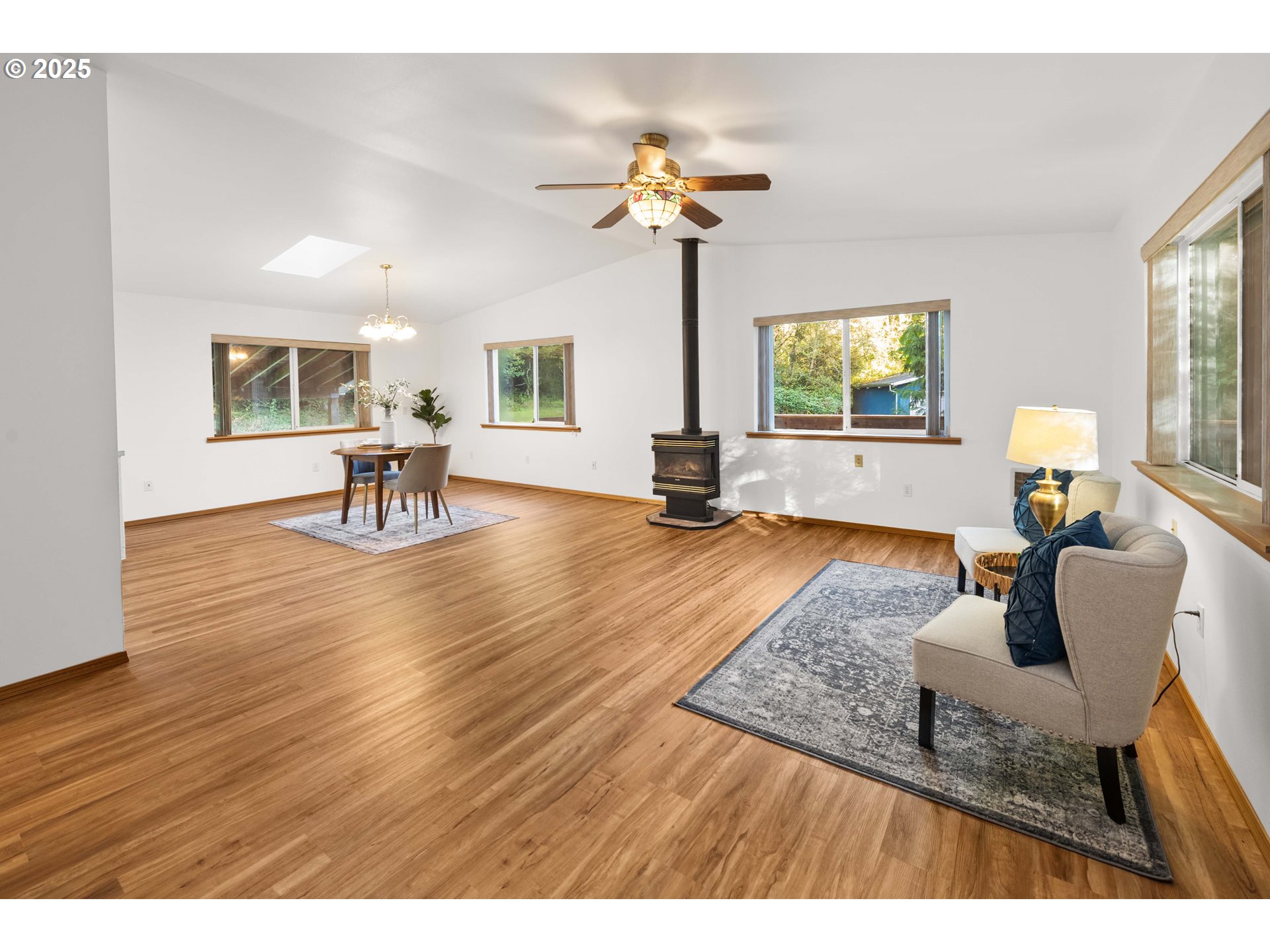 89022 Welch Road Astoria, OR 97103 - Photo 6 of 42 a living room with furniture and a wooden floor