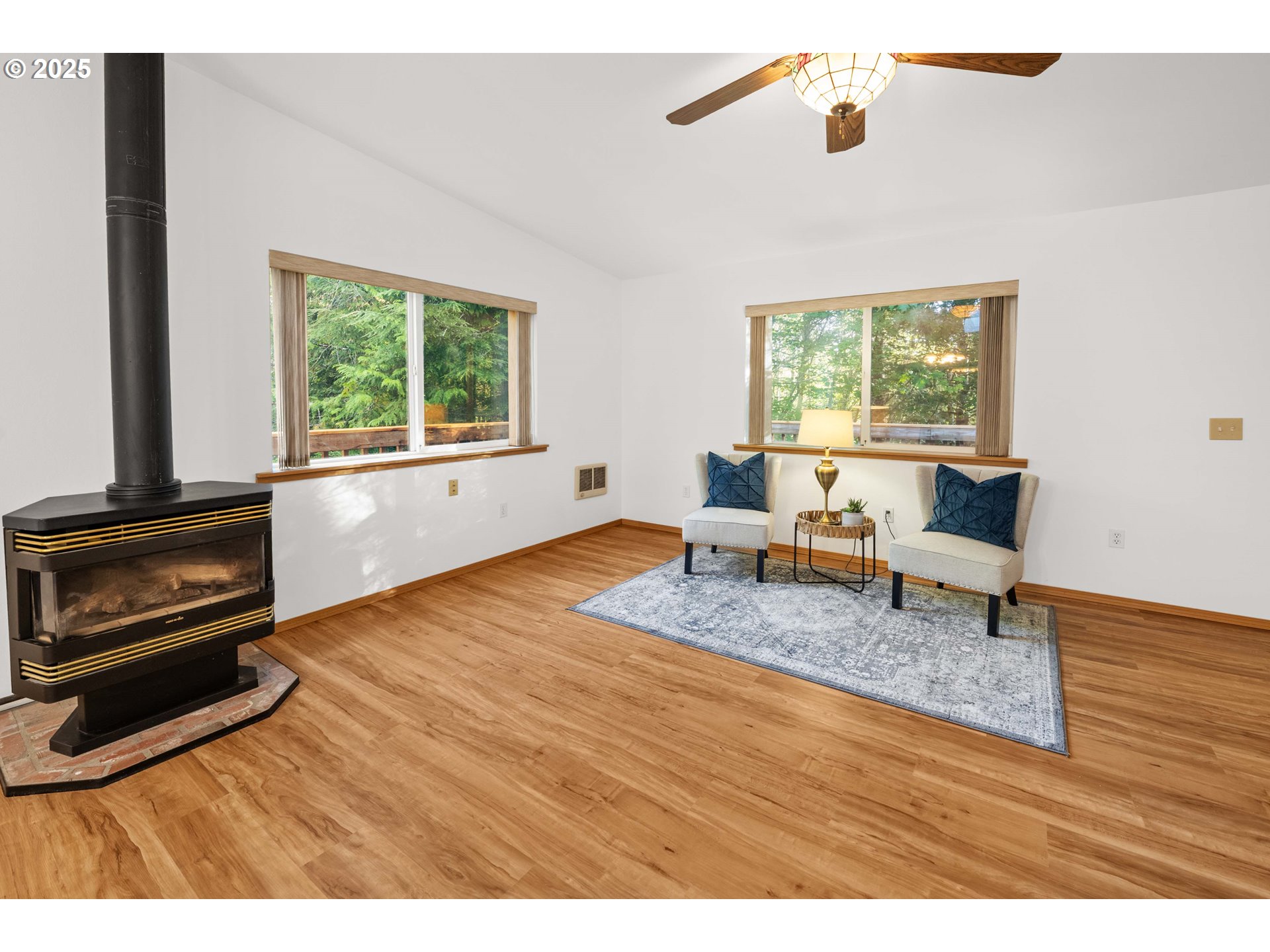 89022 Welch Road Astoria, OR 97103 - Photo 9 of 42 a living room with furniture and a flat screen tv