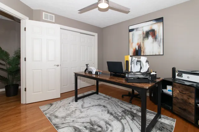 a bedroom with a bed and a cabinets