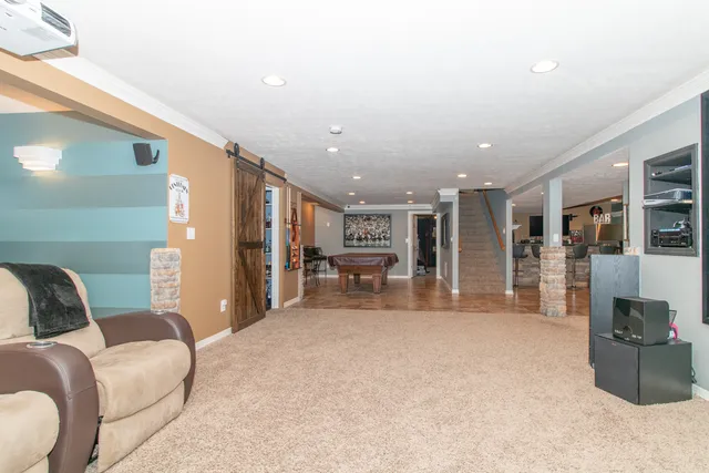 a bedroom with a large bed and walk in closet