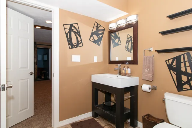 a front view of house with yard having outdoor seating