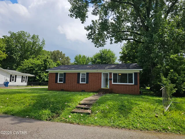 front view of house with a yard