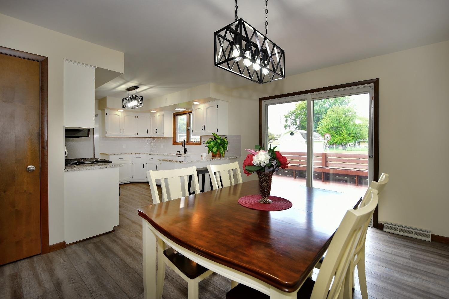 9020 Bryan Street Crown Point, IN 46307 - Photo 12 of 31 a view of a dining room with furniture window and outside view