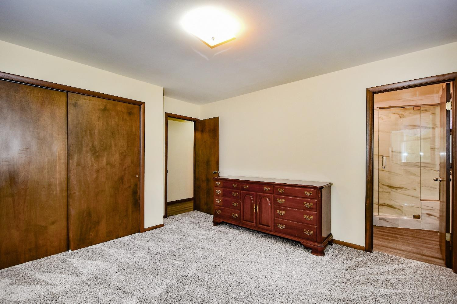 9020 Bryan Street Crown Point, IN 46307 - Photo 19 of 31 a view of a bedroom with closet area