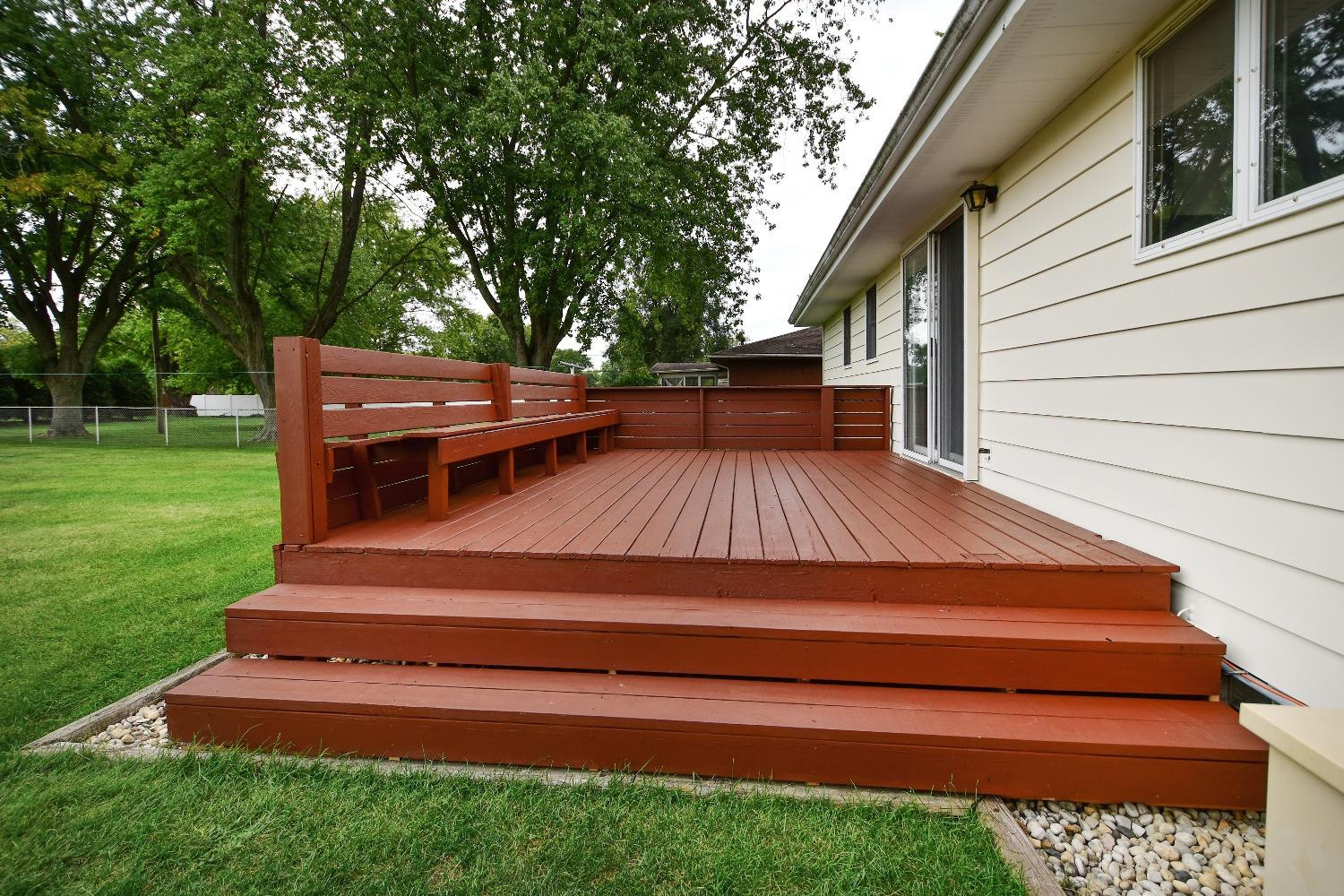 9020 Bryan Street Crown Point, IN 46307 - Photo 27 of 31 a view of backyard with deck and garden