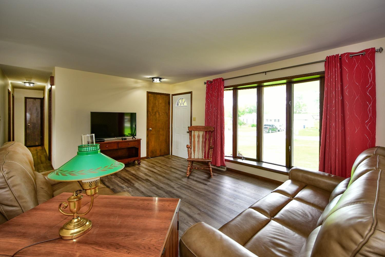 9020 Bryan Street Crown Point, IN 46307 - Photo 4 of 31 a living room with furniture fireplace and flat screen tv