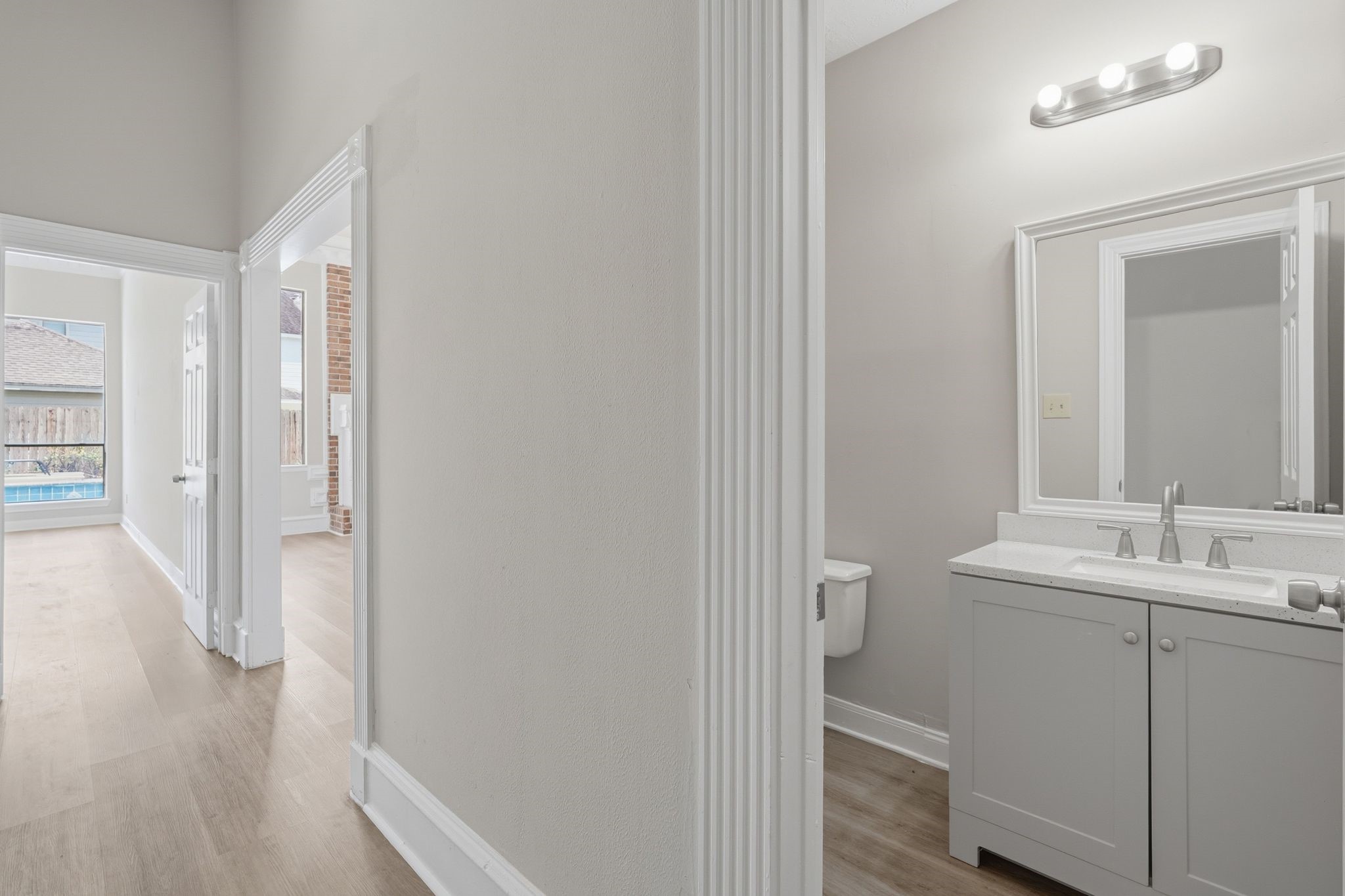 7611 Naremore Drive Spring, TX 77379 - Photo 16 of 48 Convenience Half bath between the living room and the foyer!