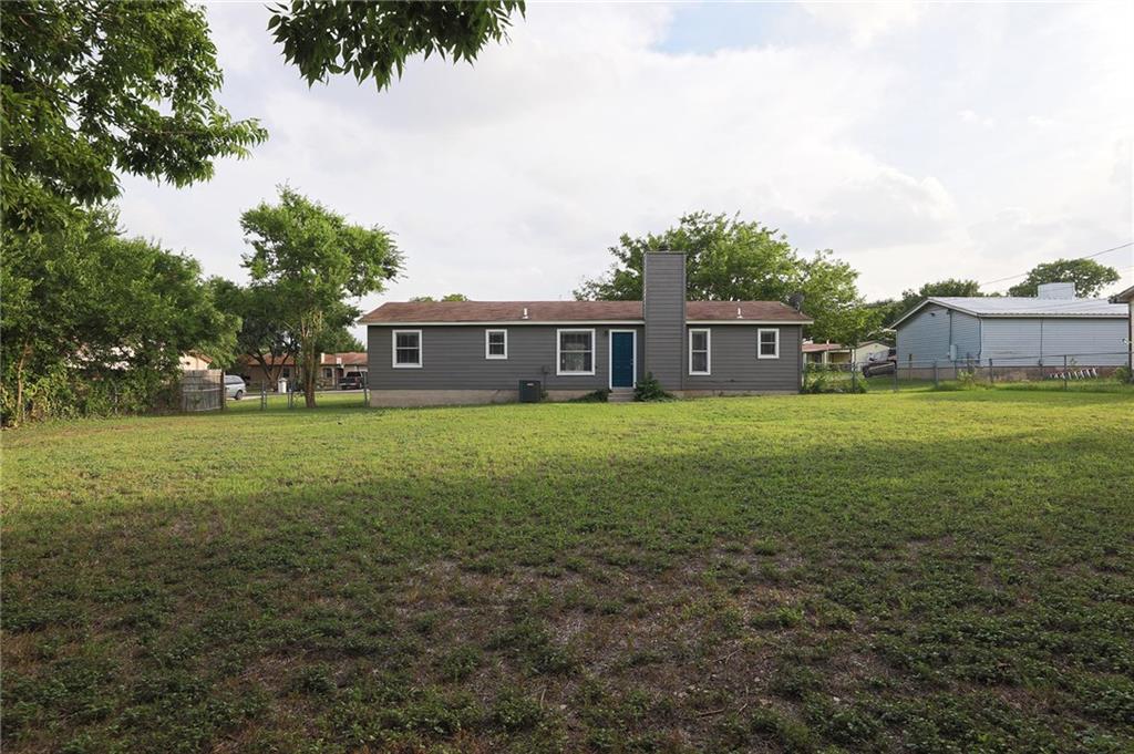 1410 Ransom Street Pflugerville, TX 78660 - Photo 22 of 22 a view of a house with a big yard