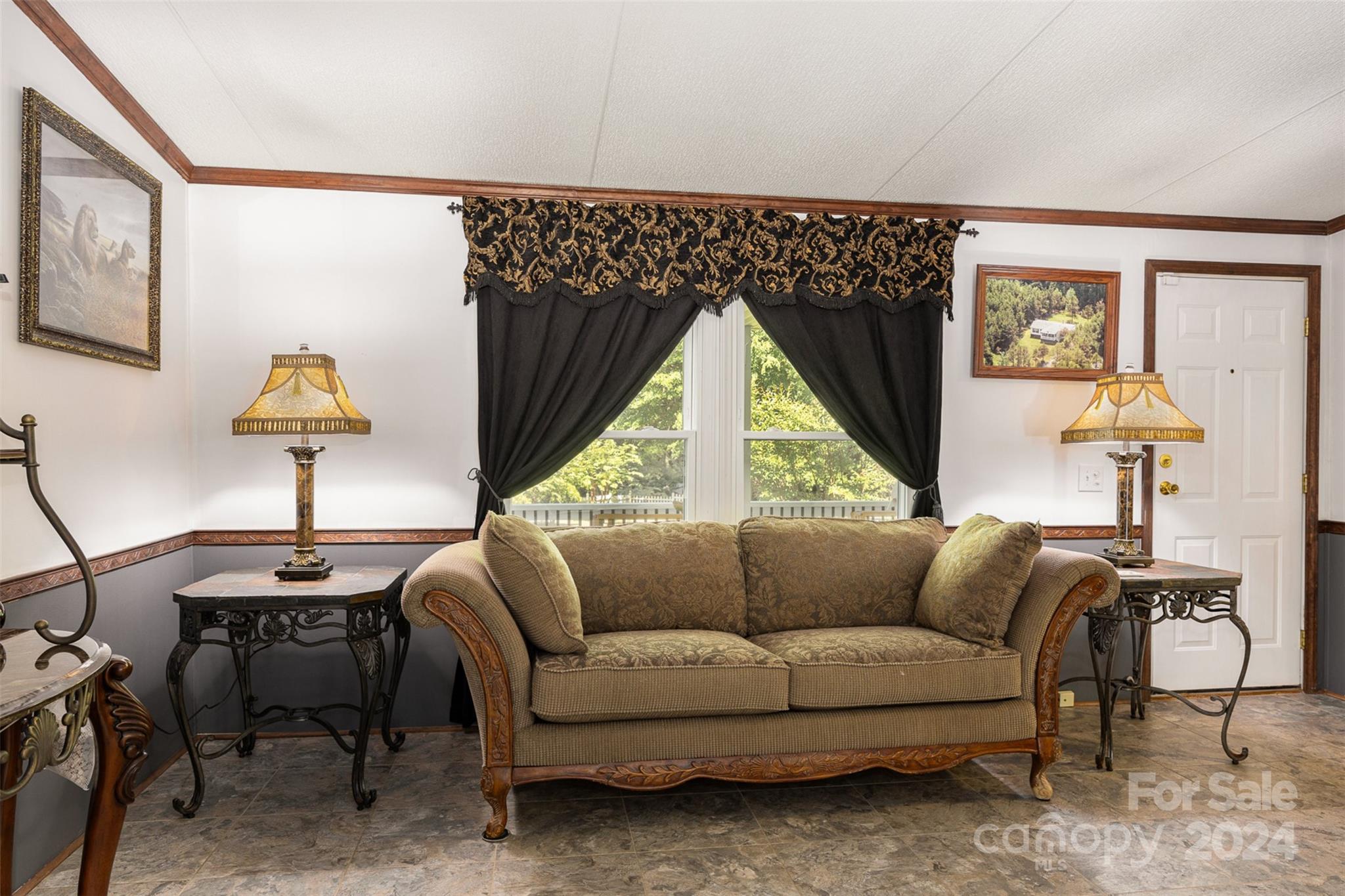 417 Old Tulip Farm Road Salisbury, NC 28147 - Photo 6 of 35 a living room with furniture and a window