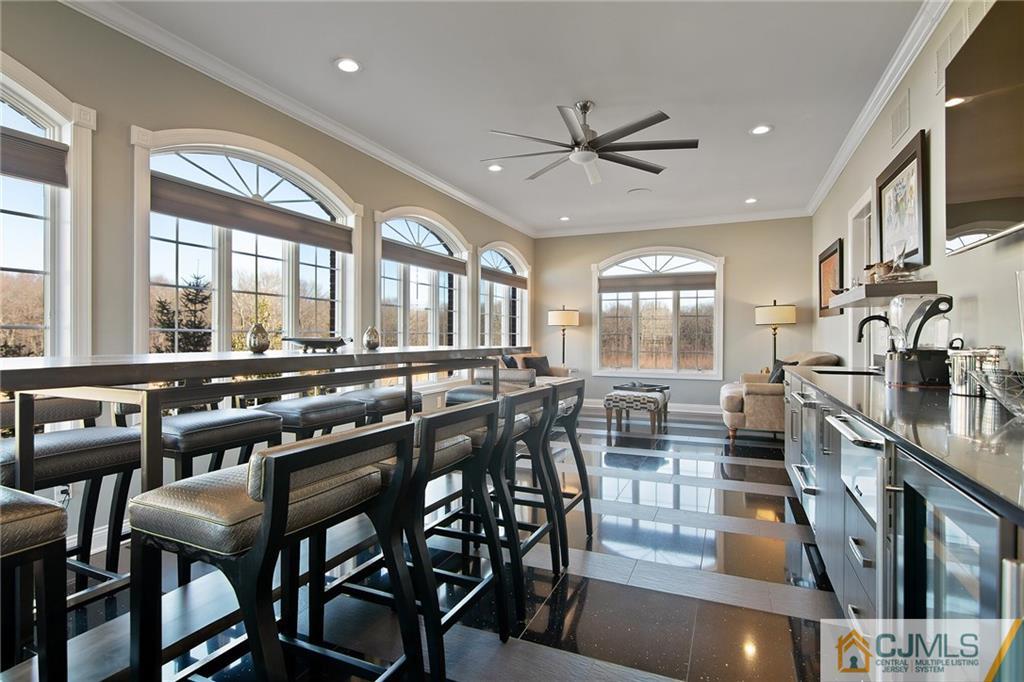 25 Preakness Drive Monroe Township, NJ 08831 - Photo 19 of 48 a view of a dining room with furniture window and wooden floor