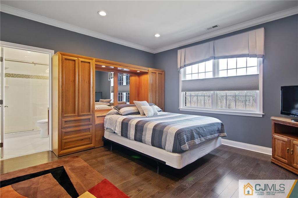 25 Preakness Drive Monroe Township, NJ 08831 - Photo 24 of 48 a bed sitting in a spacious bedroom next to a window