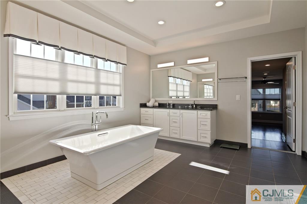 25 Preakness Drive Monroe Township, NJ 08831 - Photo 25 of 48 a large white kitchen with a sink