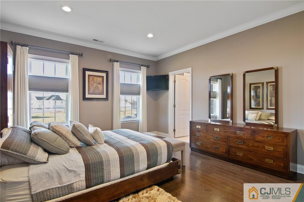 25 Preakness Drive Monroe Township, NJ 08831 - Photo 33 of 48 a bedroom with a bed and window