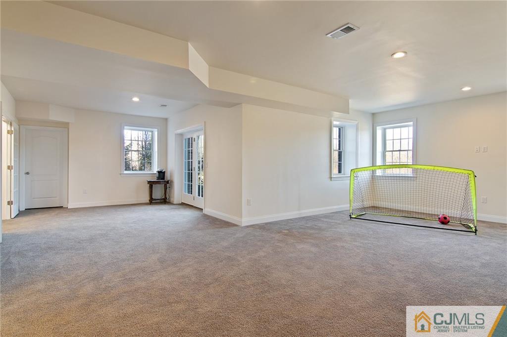 25 Preakness Drive Monroe Township, NJ 08831 - Photo 38 of 48 a view of an empty room with a window