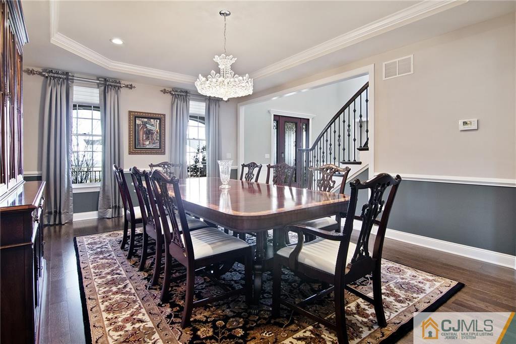 25 Preakness Drive Monroe Township, NJ 08831 - Photo 5 of 48 a view of a dining room with furniture window and wooden floor