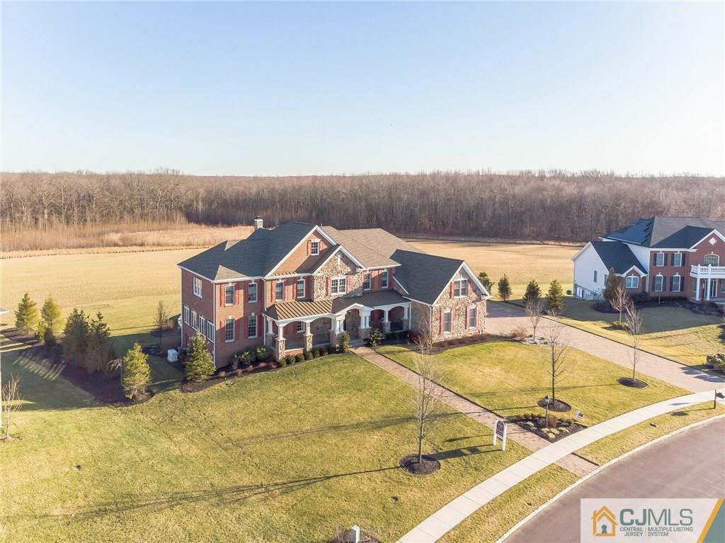 25 Preakness Drive Monroe Township, NJ 08831 - Photo 48 of 48 a view of a swimming pool and lounge chair