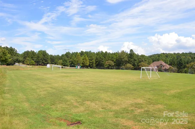 a view of a park with swings and slides