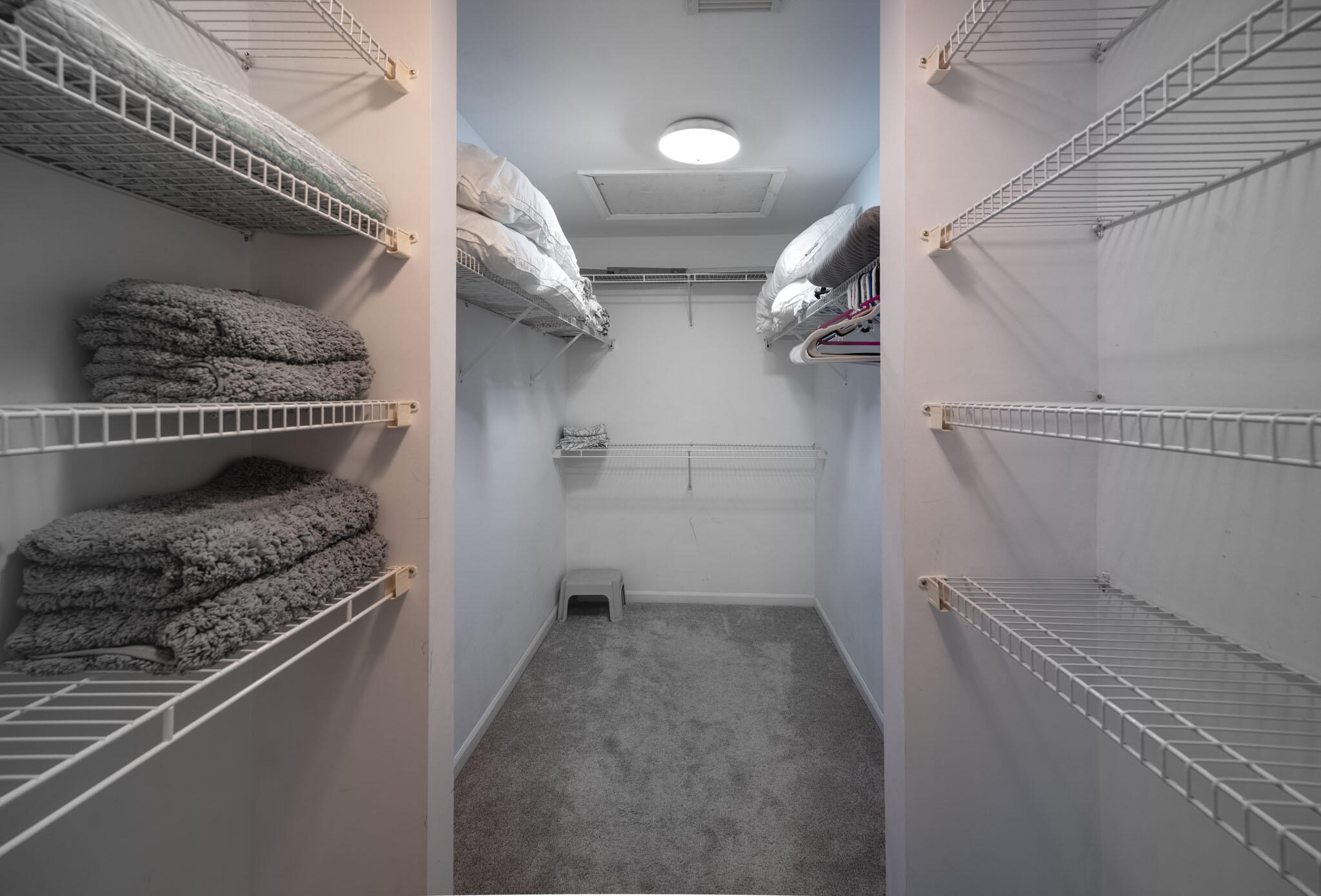 180 9th Street Key Colony Beach, FL 33051 - Photo 16 of 38 a view of storage and utility room with racks on the wall