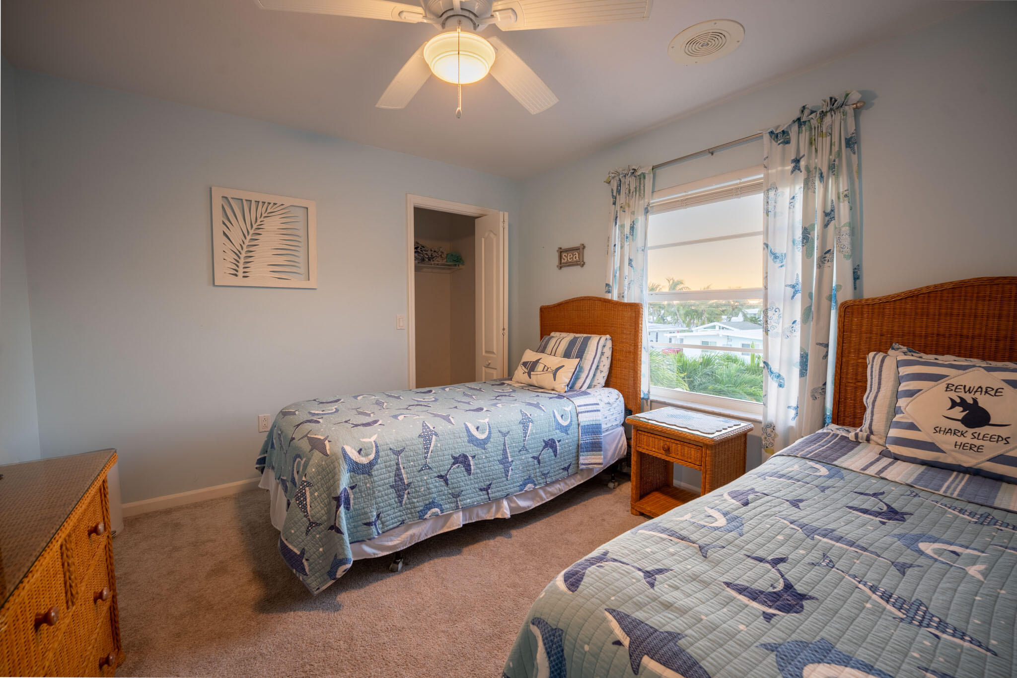 180 9th Street Key Colony Beach, FL 33051 - Photo 19 of 38 a bedroom with two beds and a large window