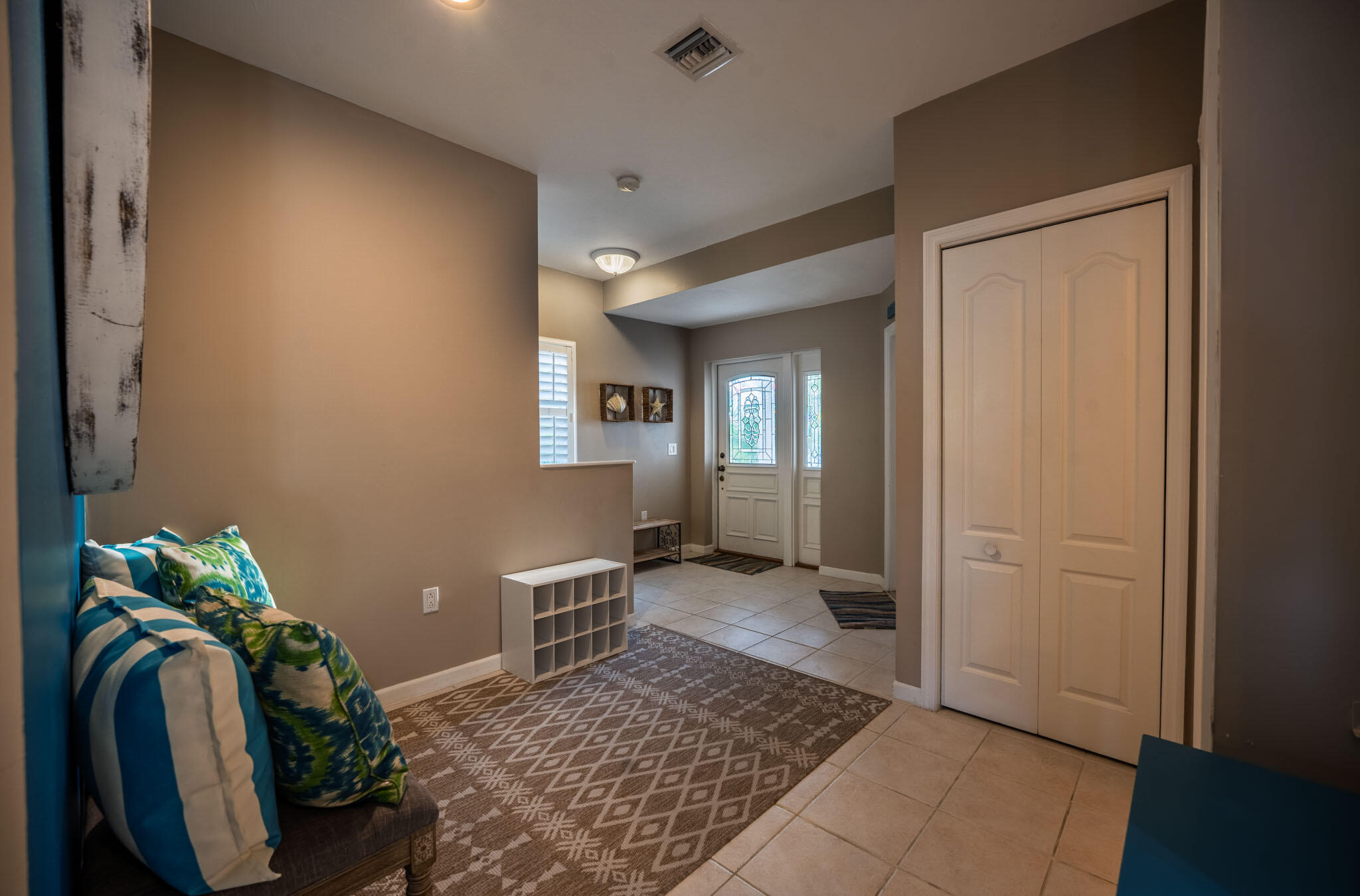 180 9th Street Key Colony Beach, FL 33051 - Photo 21 of 38 a view of a livingroom with furniture and front door