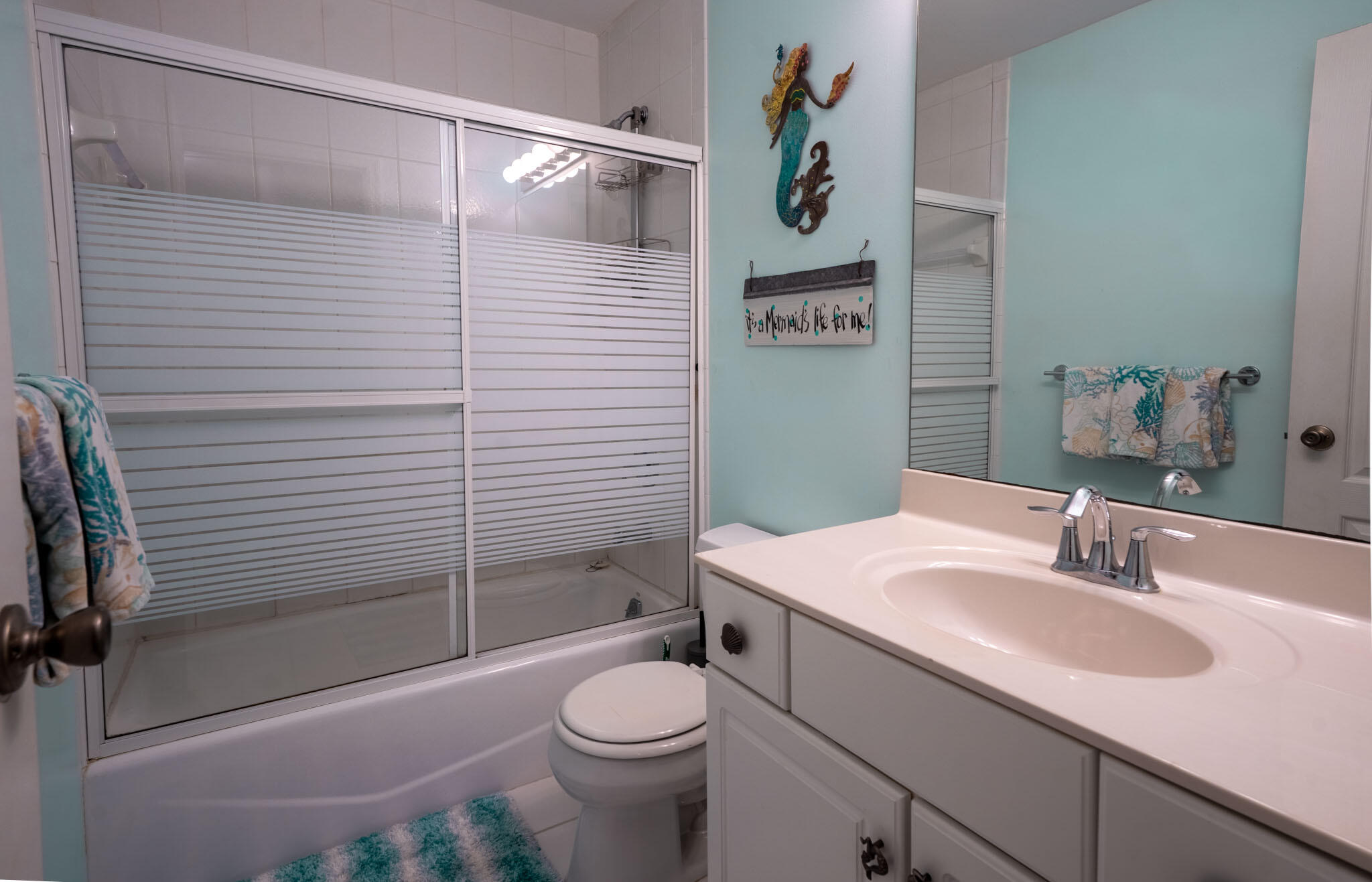 180 9th Street Key Colony Beach, FL 33051 - Photo 22 of 38 a bathroom with a sink a toilet and shower