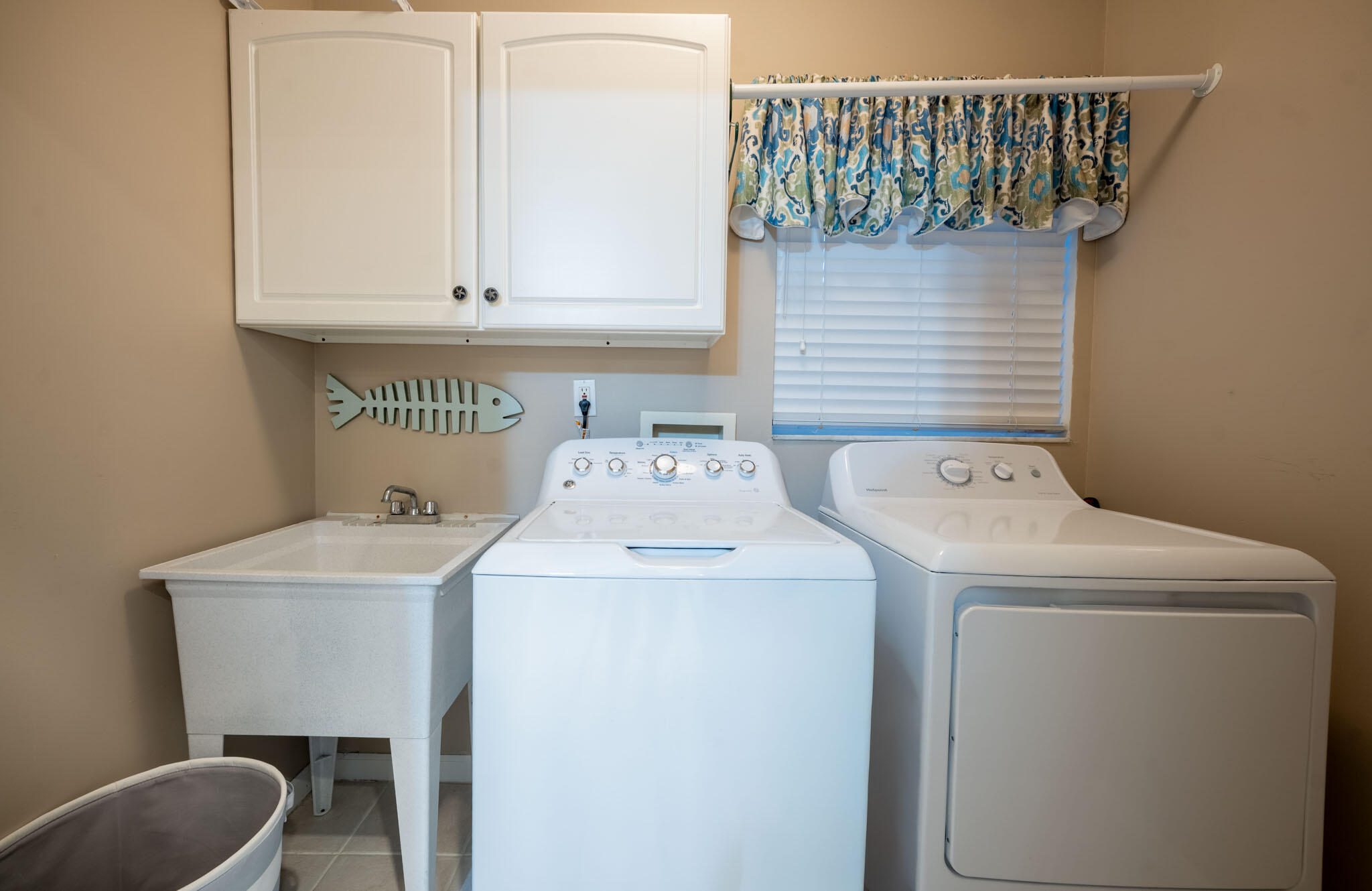 180 9th Street Key Colony Beach, FL 33051 - Photo 24 of 38 a utility room with dryer and washer