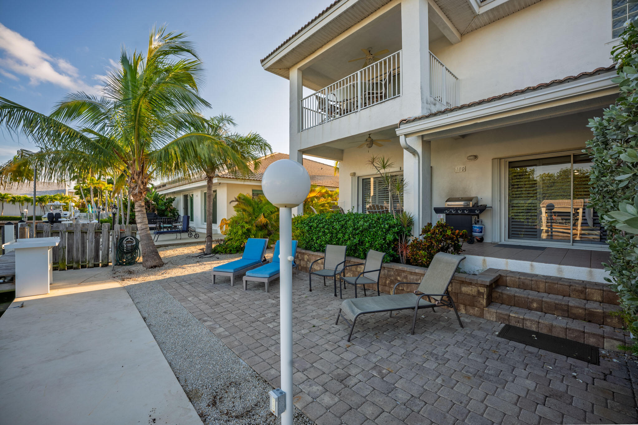 180 9th Street Key Colony Beach, FL 33051 - Photo 26 of 38 a view of a house with a patio