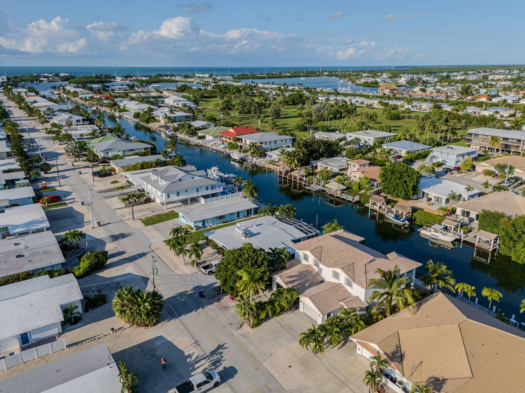 180 9th Street Key Colony Beach, FL 33051 - Photo 32 of 38 an aerial view of residential houses with outdoor space