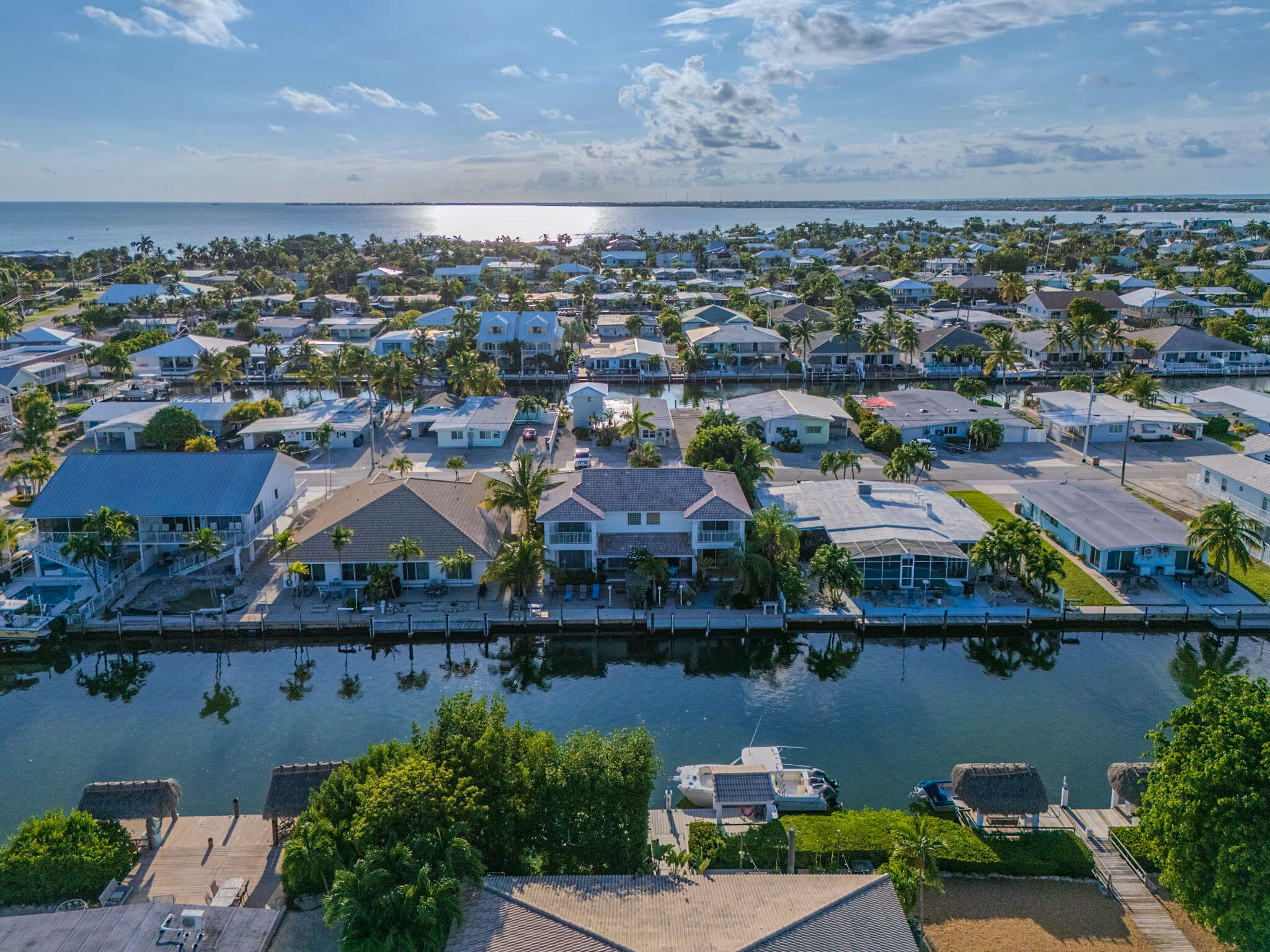 180 9th Street Key Colony Beach, FL 33051 - Photo 34 of 38 an aerial view of residential building and lake