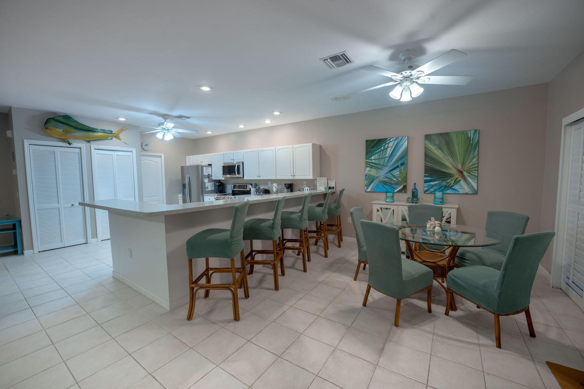 180 9th Street Key Colony Beach, FL 33051 - Photo 5 of 38 a view of a dining room with furniture