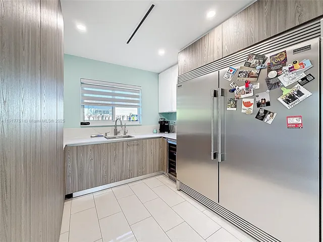a bathroom with a toilet a sink and shower