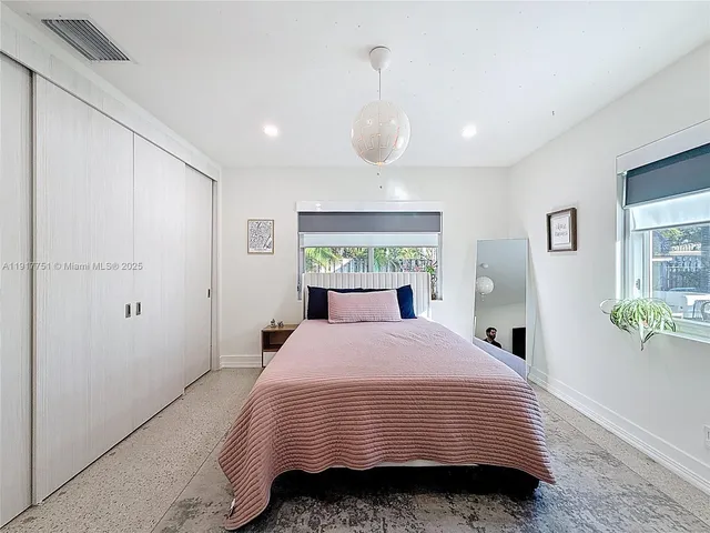 a bathroom with a sink a washer and dryer