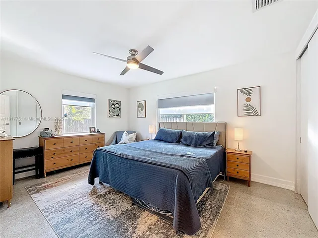 a house view with a seating space and garden