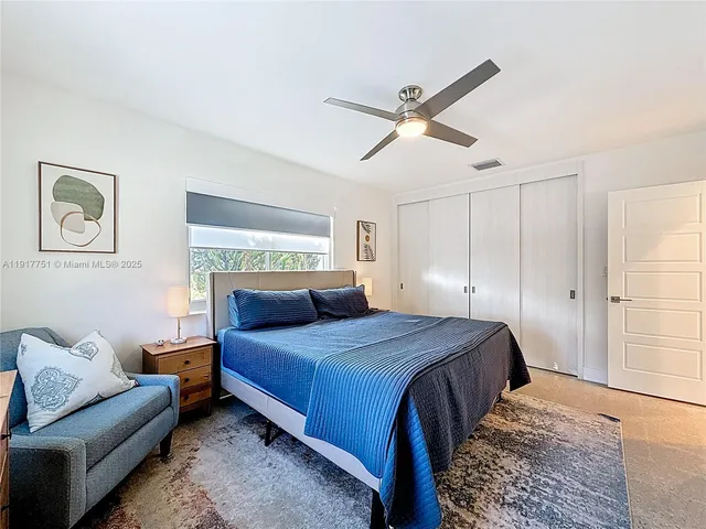 a view of a backyard with sitting area