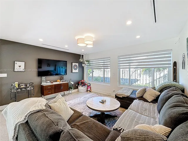 a kitchen with stainless steel appliances a refrigerator and a sink
