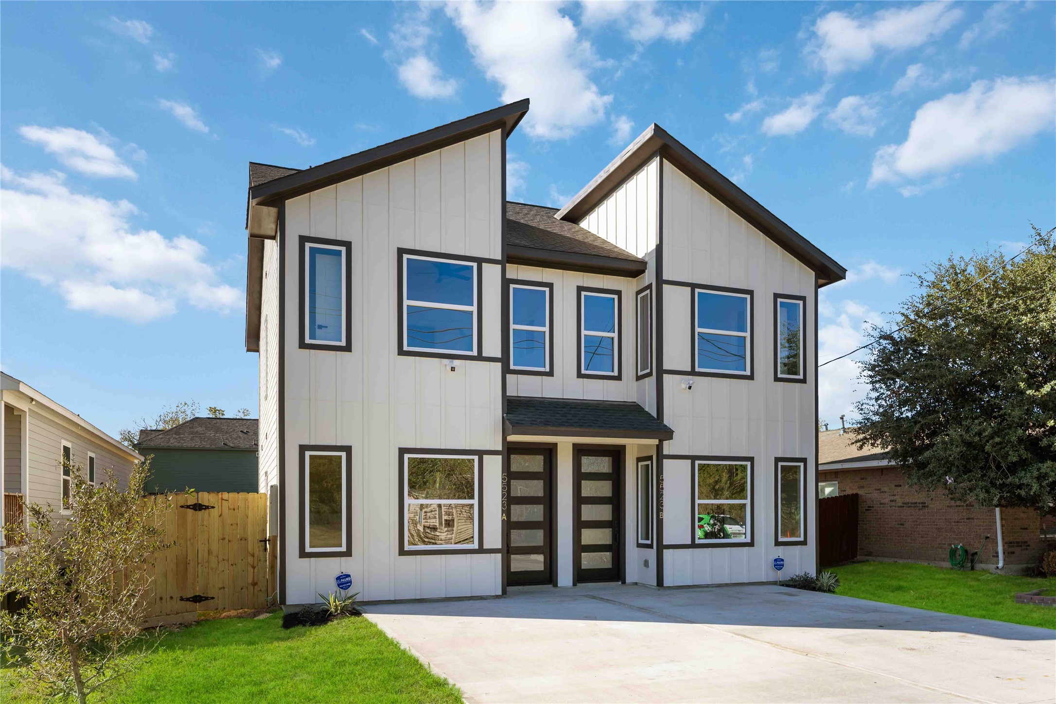 5523 Haight Street, Unit B Houston, TX 77028 - Photo 2 of 17 a view of a house with a yard and plants